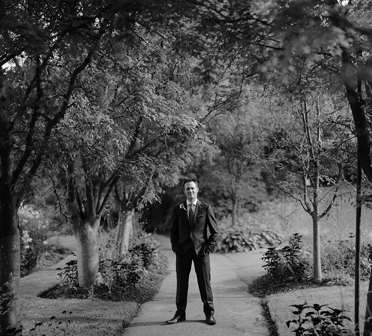 black and white groom portrait