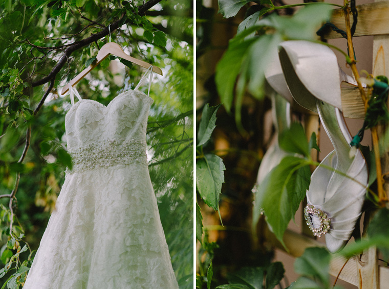 lace wedding dress hanging in tree