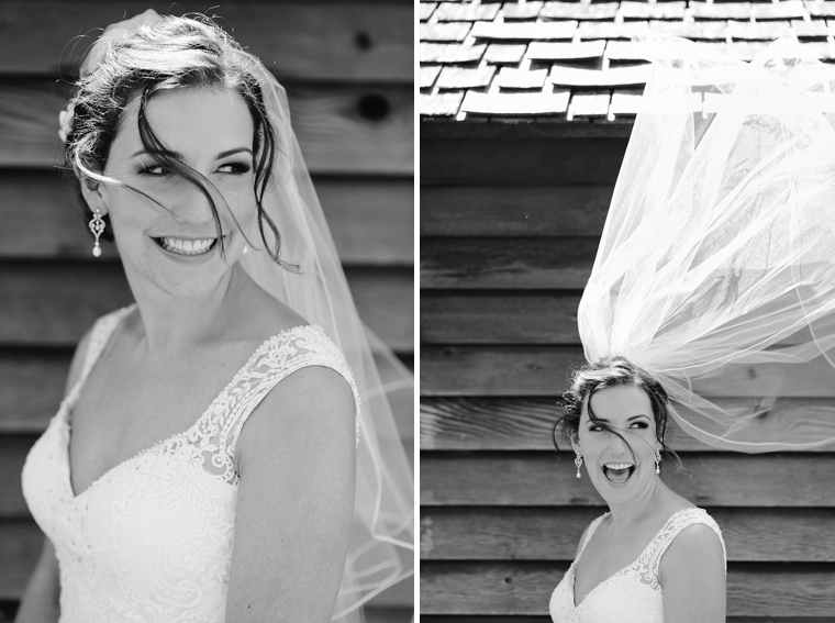bride laughing as veil blows 