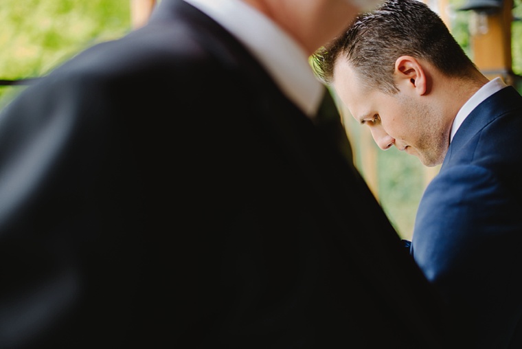 emotional groom waiting for bride