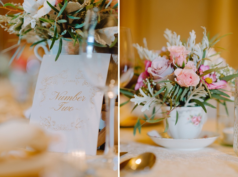 pink flowers in teacup wedding decor