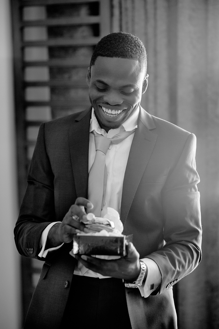 groom opening wedding gift