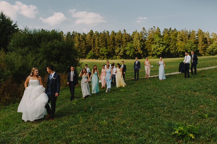 wedding party walking through the black forest in germany