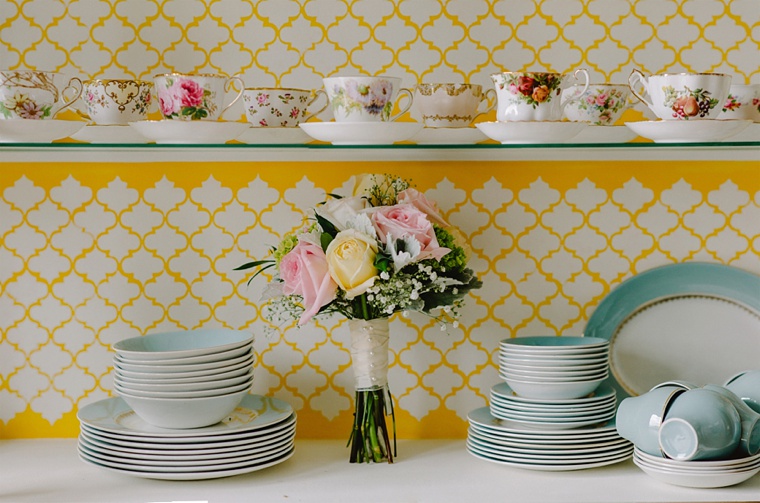 wedding bouquet in china cabinet