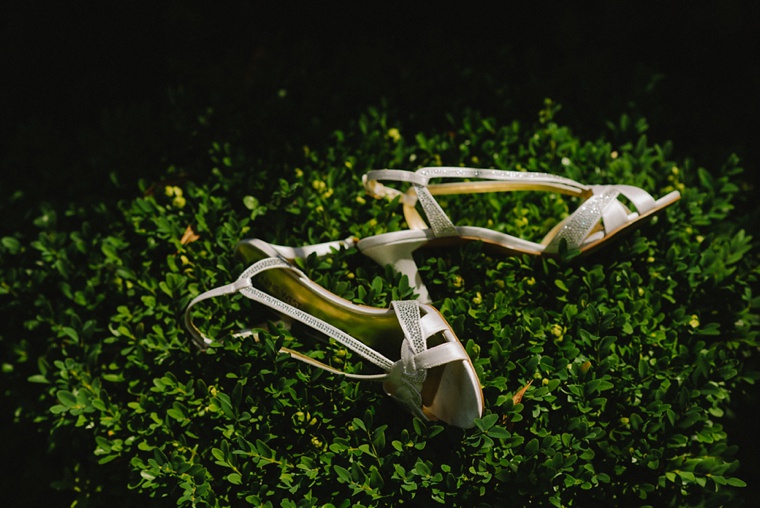 Unique photo of white wedding shoes