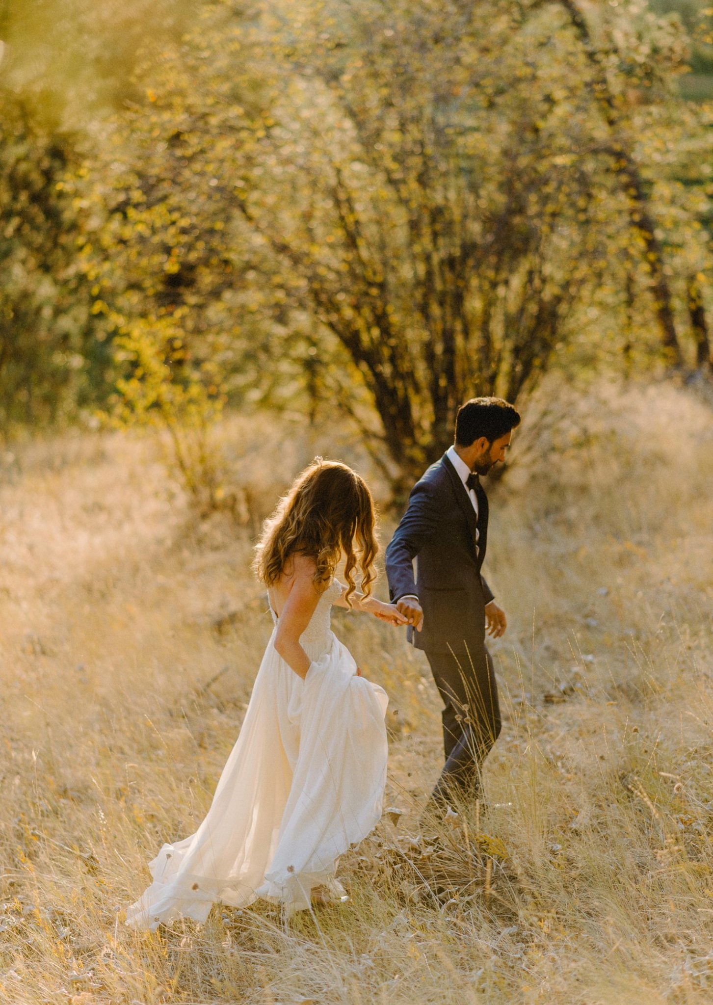 candid sunset wedding portraits in kelowna