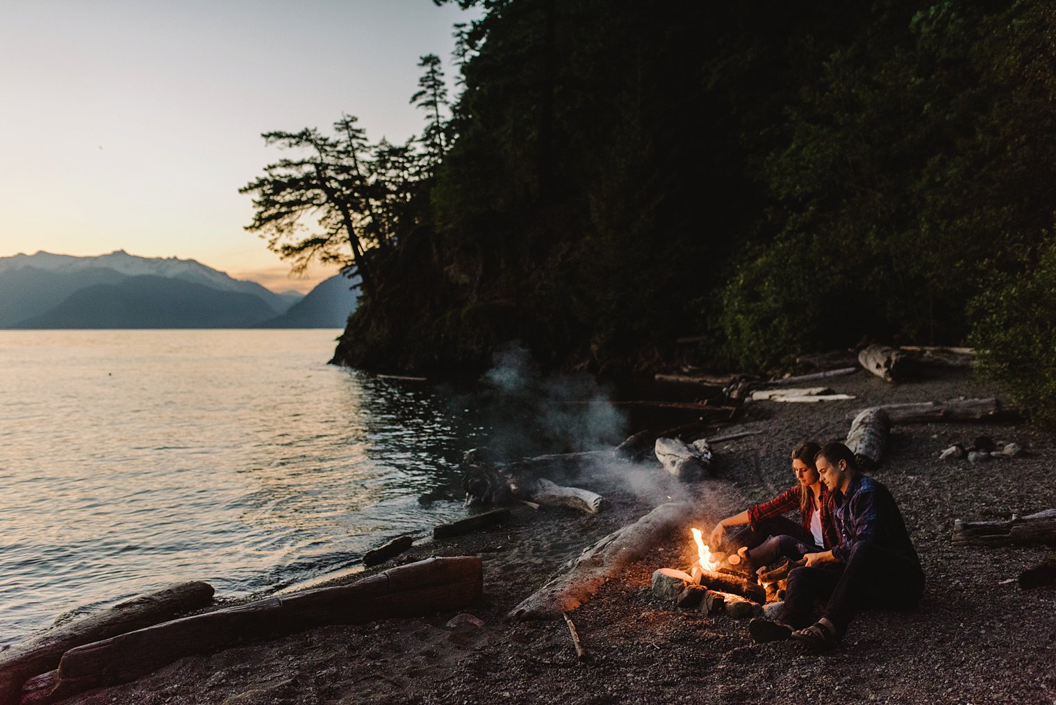 sunset campfire engagement portrait