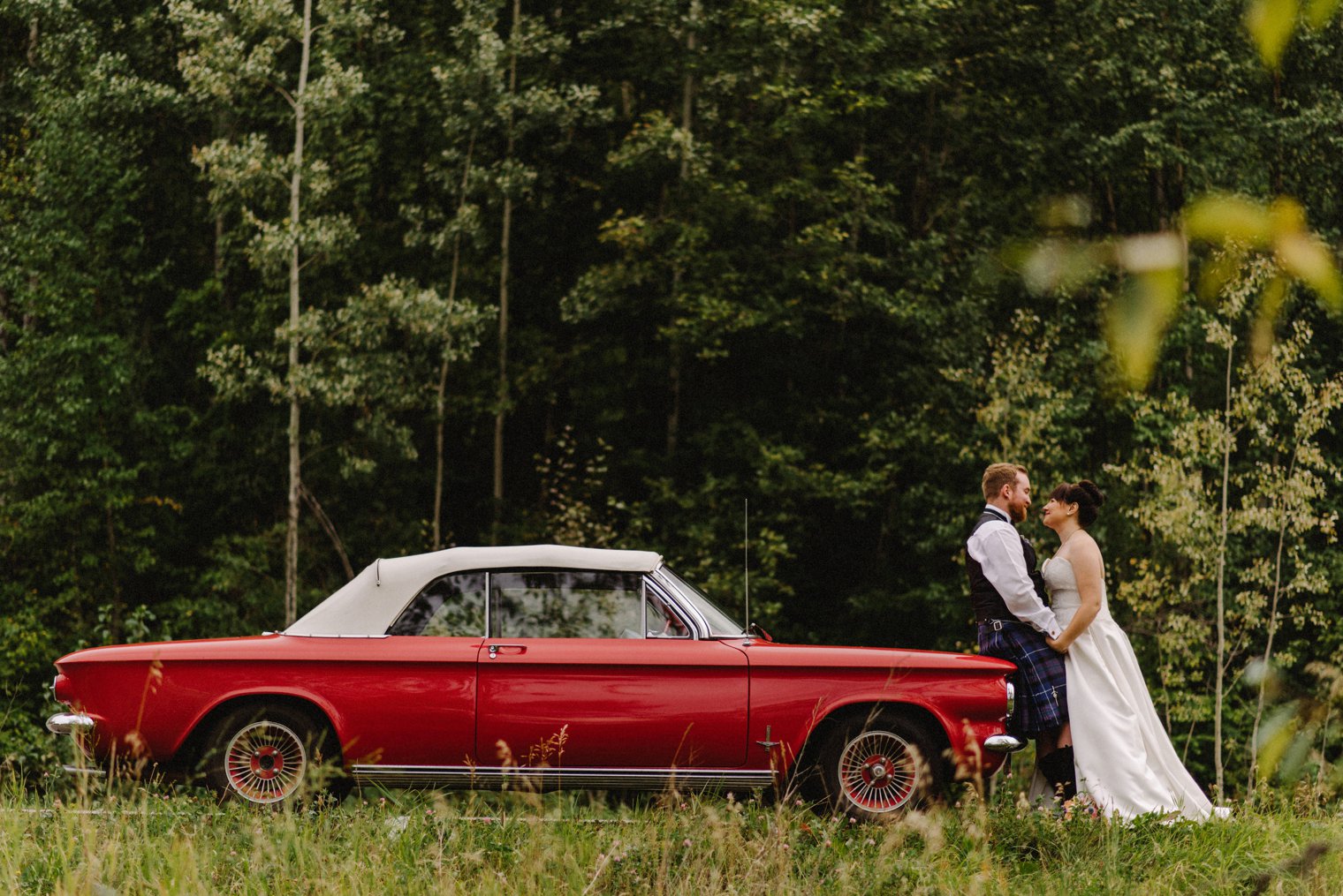wedding photos with red convertible mustang